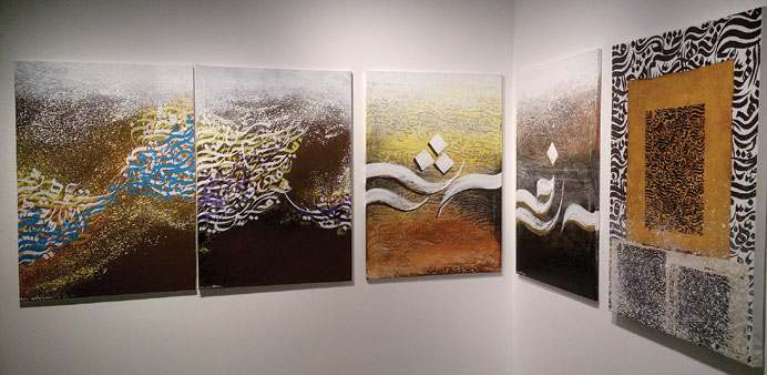 WIDE CANVAS: Qatari artist Moza al-Kuwariu2019s artworks on display at Visual Arts Centre in Katara.                      Photos by Umer Nangiana