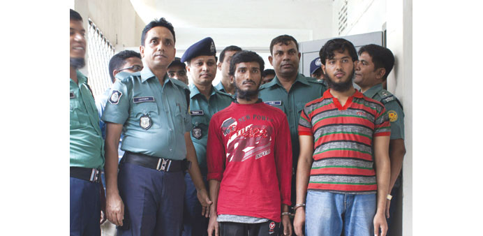 Police parade suspects before media representatives in Dhaka yesterday, after blogger Washiqur Rahman was hacked to death in the Bangladesh capital.