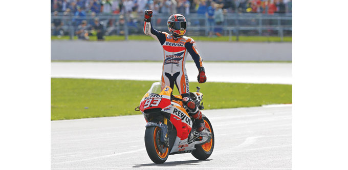Repsol Honda rider Marc Marquez celebrates winning the British Grand Prix at the Silverstone Race Circuit yesterday. (Reuters)