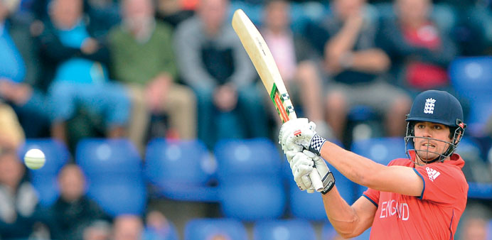 Englandu2019s Alastair Cook bats during the ICC Champions Trophy match against New Zealand in Cardiff yesterday. (AFP)
