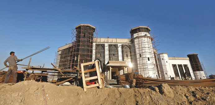 An Afghan works at a new parliament building constructed by an Indian project in Kabul.