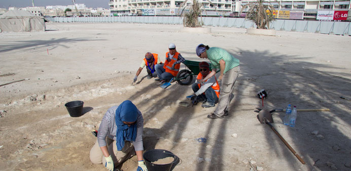 Archaeologists excavating the open ground next to the Qubib Mosque adjacent to Souq Waqif in Doha.