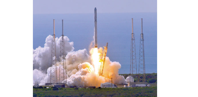 Space Xu2019s Falcon 9 rocket as it lifts off from space launch complex 40 at Cape Canaveral, Florida yesterday with a Dragon CRS7 spacecraft. The unmanne