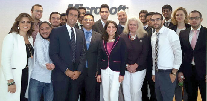 Dana Shell Smith with the team members and Microsoft Qatar officials.