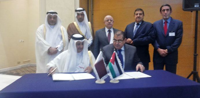  Sheikh Khalifa signing the agreement with al-Kabariti in Amman.