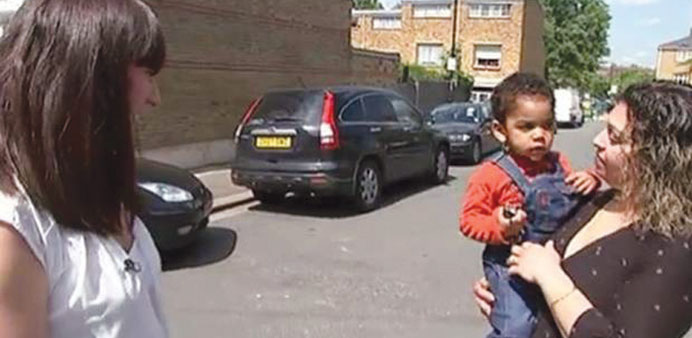 Romeo Chudasama with his mother Rekha. At left is Louise Tarrant who found the toddler in the middle of the road.