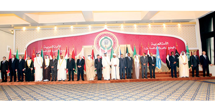 HH the Emir Sheikh Hamad bin Khalifa al-Thani and HH the Heir Apparent Sheikh Tamim bin Hamad al-Thani with Arab heads of state and delegates attendin
