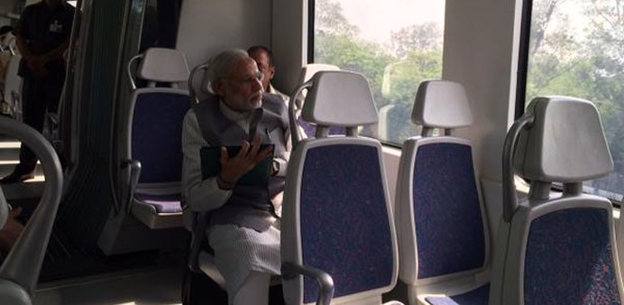  Prime Minister Narendra Modi takes a ride on a Delhi Metro train yesterday.