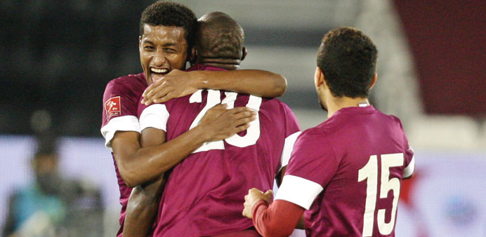 Qatar players celebrate after their 4-1 win over Saudi Arabia in the 8th West Asia Football Federation Championship at the Al Sadd stadium. PICTURE: A