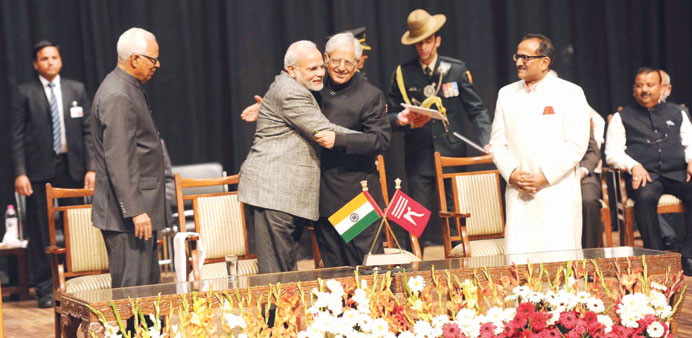 Mufti Mohamed Sayeed hugs Prime Minister Narendra Modi after the PDP leader was sworn in yesterday.