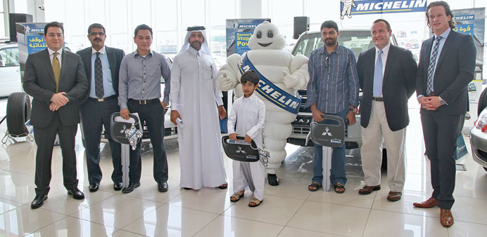 The winners of Michelin Summer Campaign with officials.
