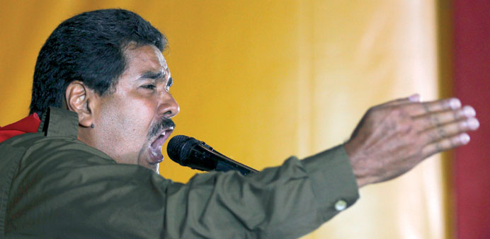 Maduro (above) has the backing of the military.