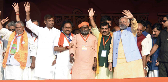 Prime Minister Narendra Modi waves to supporters during a rally in Darbhanga in Bihar yesterday.