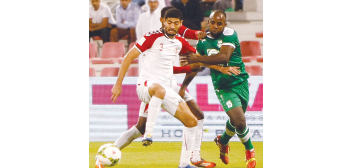 Al Ahliu2019s Dioko Kaluyituka (right) vies for the ball with Al Shamalu2019s Haitham El Ashry during their QSL match.