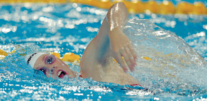 American 18-year-old Missy Franklin swims during training for the World Swimming Championships, beginning at the Sant Jordi arena in Barcelona today. 