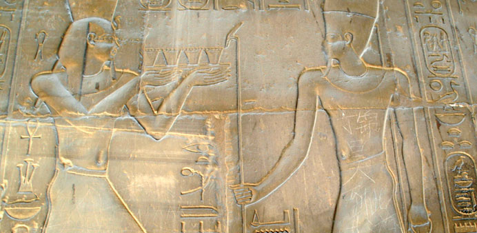 Chinese characters that read u201cDing Jinhao paid a visit hereu201d carved on a statue on the wall of an ancient temple in Luxor.