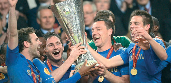 Chelsea players celebrate with their trophy after winning the Europa Cup on Wednesday. The English club beat Portuguese side Benfica 2-1 in the final.