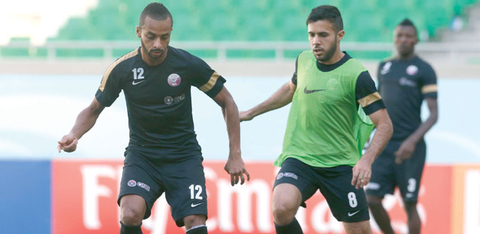 Qatar players in action during the training session on the eve of todayu2019s 2014 Brazil World Cup qualifier against Uzbekistan in Tashkent.