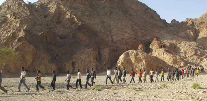   African migrants cross into Israel from Egypt.