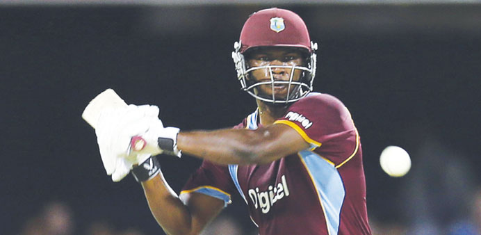 West Indiesu2019 Johnson Charles belts the Australian bowling during their Twenty20 international at the Gabba in Brisbane yesterday.
