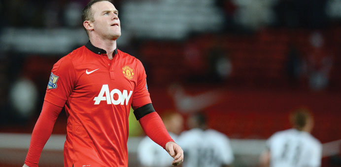 Manchester Unitedu2019s English striker Wayne Rooney leaves the field after his teamu2019s English Premier League football match against Fulham yesterday. (AF