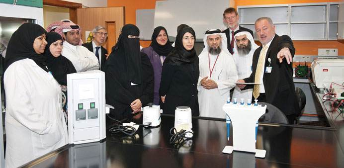 Dr al-Kuwari, Dr Janahi and other officials of HMC touring the iTRI.