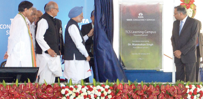 Prime Minister Manmohan Singh unveils a plaque at the foundation laying ceremony of TCS Global Learning Centre at the Technopark campus in Thiruvanant