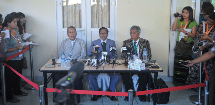 Naing Han Tha (centre), a leader of Nationwide Ceasefire Co-ordinating Team (NCCT) talks during a meeting with members of the media during the seventh