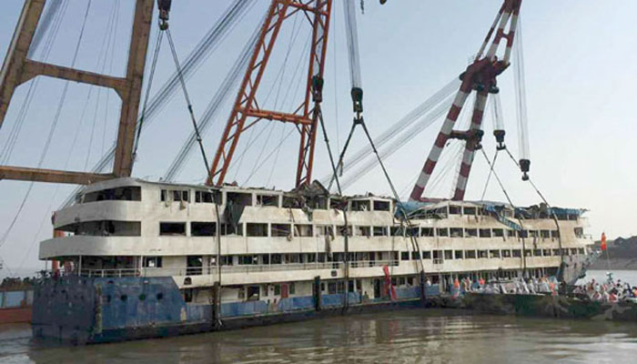 Rescue workers enter the salvaged cruise ship Eastern Star on the Yangtze on June 6, 2015.