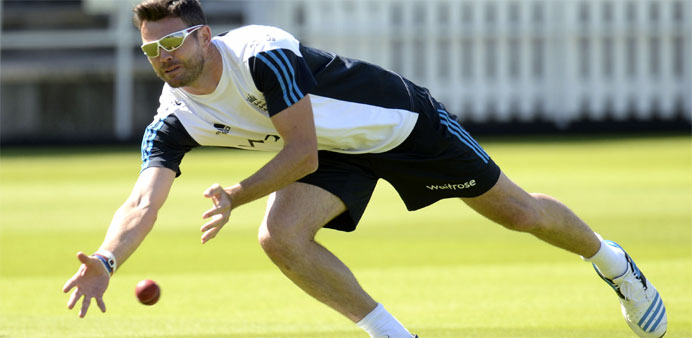 England's James Anderson prepares to catch a ball during a training session