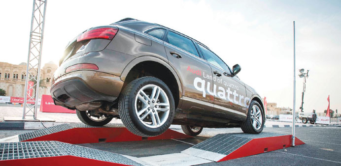 An Audi SUV being driven over a purpose-built course during the u2018quattro touru2018 road show.