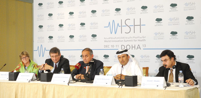 Lord Darzi, flanked by other speakers, at the press conference.