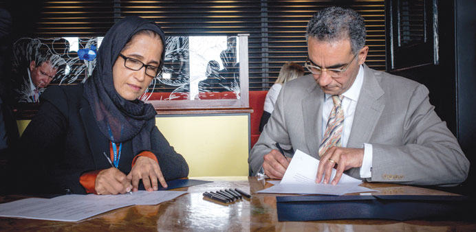 ICT Minister HE Dr Hessa Sultan al-Jaber and ICANN president Fadi Chehadu00e9 sign the MoU.