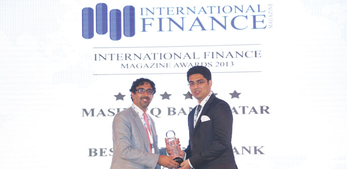 Mashareq Qatar representative receiving the award.