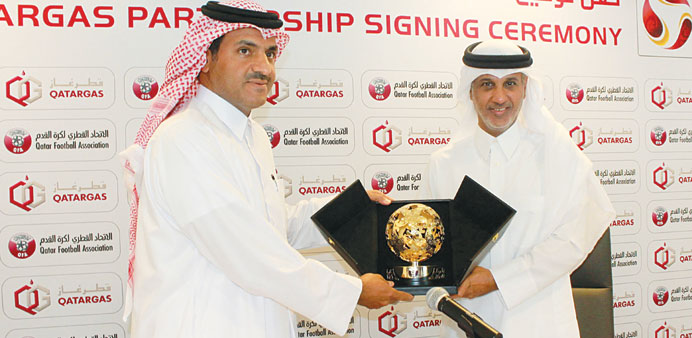 QFA President Sheikh Hamad bin Khalifa bin Ahmed al-Thani (right) and Qatargas CEO Sheikh Khalid bin Khalifa al-Thani during Q-League sponsorship deal