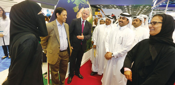 Gary Sykes and Dr Zaid Chowdhury welcome HE the Minister of Energy and Industry Dr Mohammed bin Saleh al-Sada.