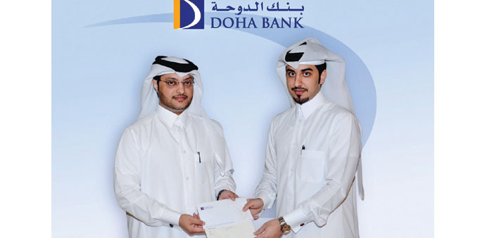 Abualfain and al-Ali after signing the partnership agreement.