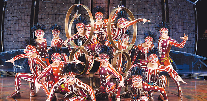 A group of Dralion artists performing on the stage.