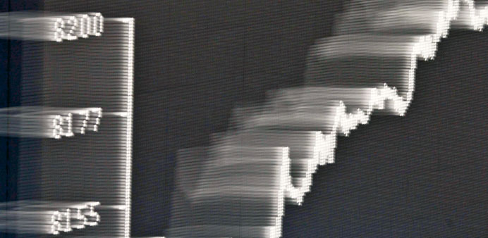  An image made with a camera movement of the display board showing the highest recorded Dax index at 8,197.72 during daily trading at the German Stock