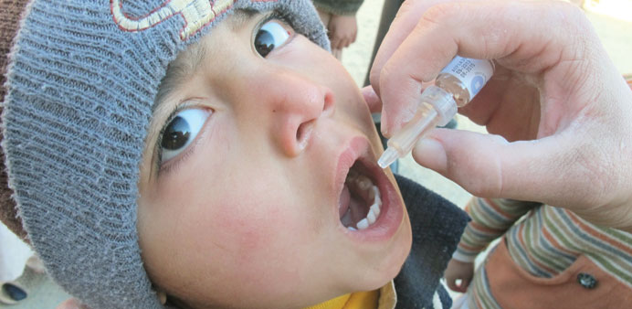 Oral polio vaccine being administered. File picture