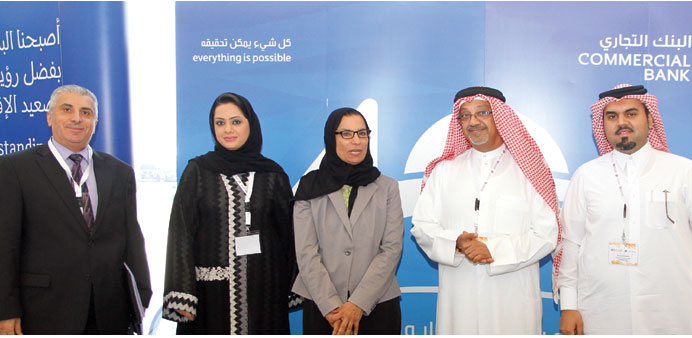 Al-Raisi (fourth left) with QU president Prof Sheikha Abdulla al-Misnad and other officials at the Summit.