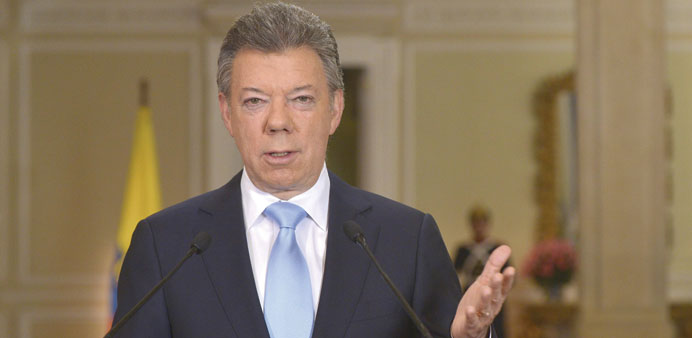 President Juan Manuel Santos delivers a speech at the presidential palace in Bogota in this handout photo released by the Colombian Presidency.