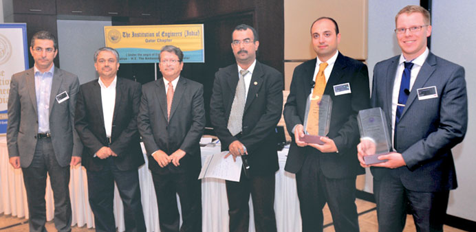 The Institution of Engineers (India) Qatar chapter office-bearers with ABB officials Marcus Westerlund and Davidde Tacconi at the seminar.