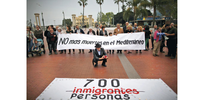 People hold a banner that reads u2018No more deaths in the Mediterraneanu2019 during a protest last week in Malaga, southern Spain. 