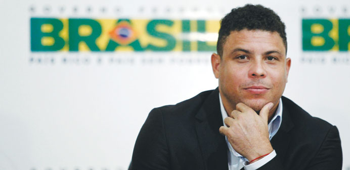 File picture of Former Brazilian striker and member of the World Cupu2019s local organising committee Ronaldo speaking during a news conference.