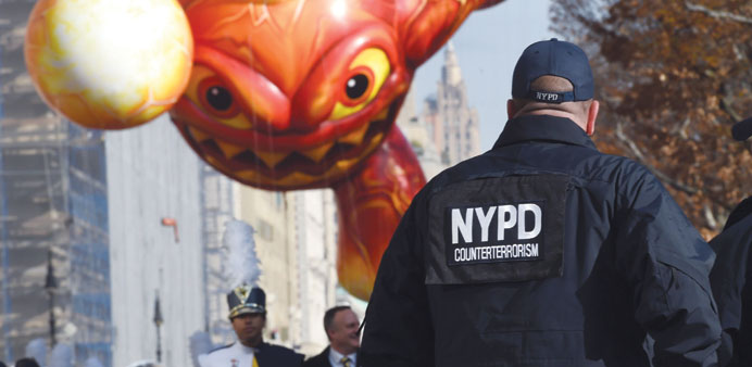 New York police watch over the parade route during the 89th Annual Macyu2019s Thanksgiving Day Parade.