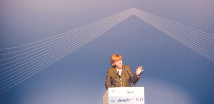  Merkel speaking at the 2013 Family Summit in Berlin.