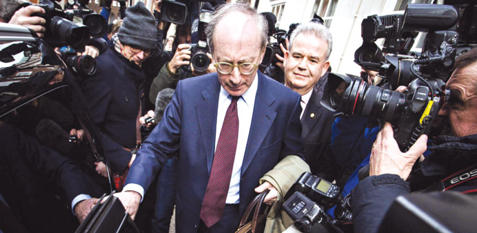 Former foreign minister Malcolm Rifkind leaves an office in Westminster in London yesterday. Rifkind said he would leave parliament over the u201ccash for