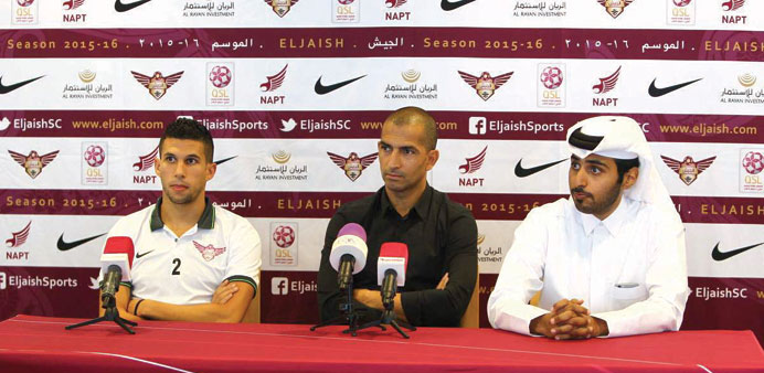 El Jaish head coach Sabri Lamouchi (centre).