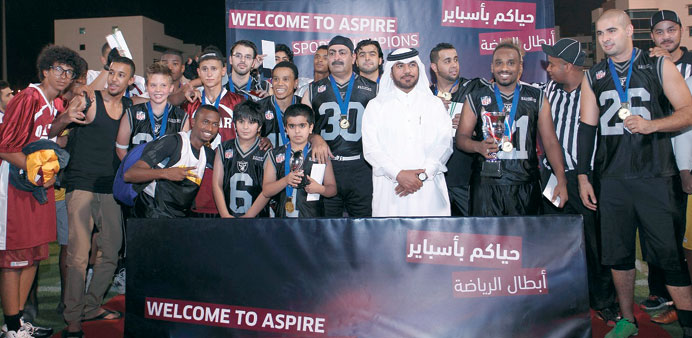 Officials with the winners